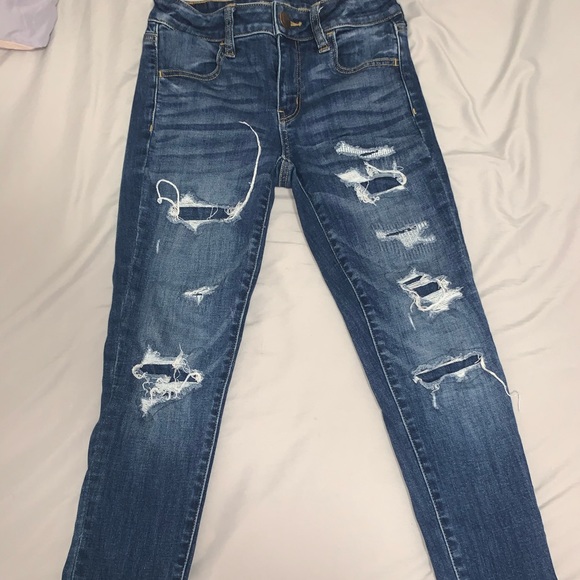 AMERICAN EAGLE BLUE RIPPED JEANS - Picture 1 of 4